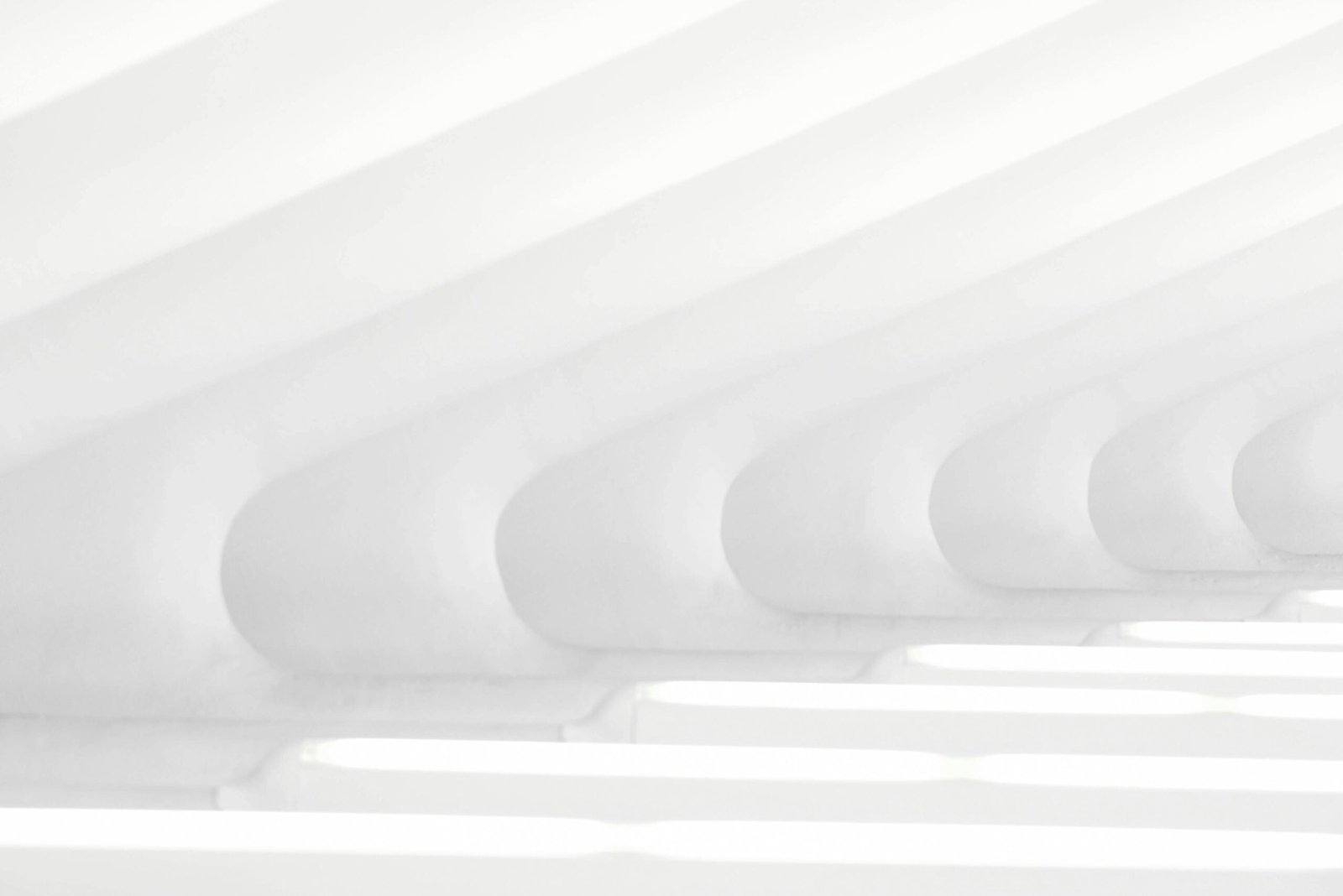 Minimalist white architectural interior showcasing futuristic design in New York.